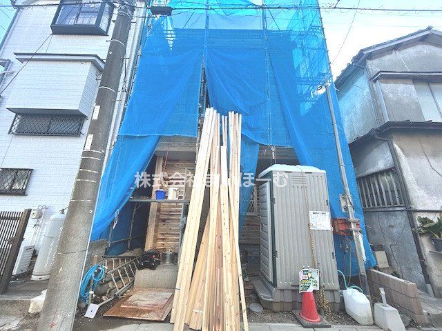 ��ʌ�����s�{�O��3���ڂ̐V�z��ˌ��Ă̌��n�O�ώʐ^